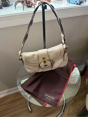 Coach Soho Buckle Cream Leather Shoulder Bag with Gold-Tone Buckle Braided strap